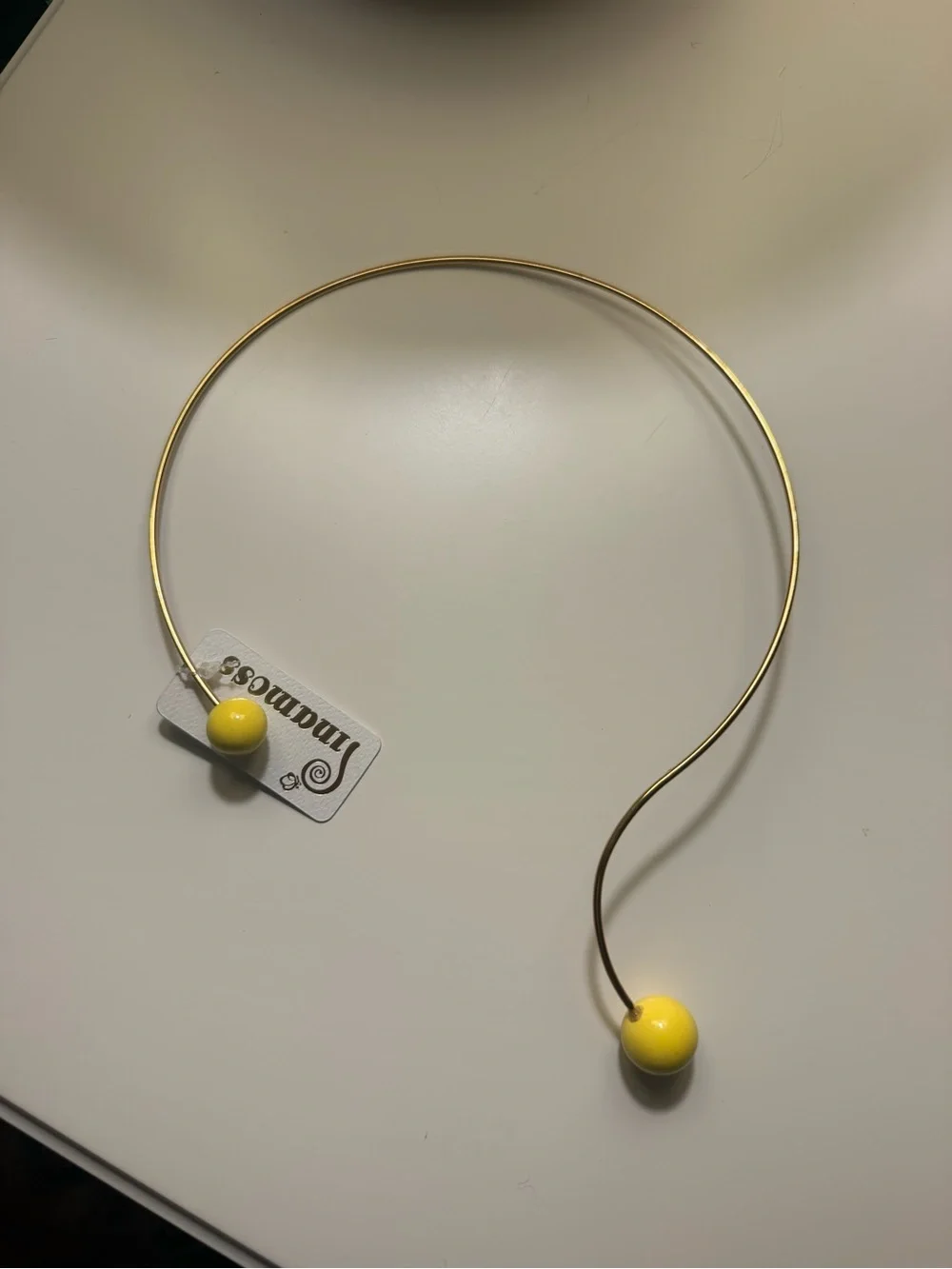 Gold necklace with yellow beads